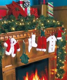 christmas stockings hanging from a fireplace mantle