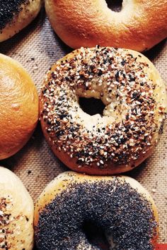 assorted bagels with sprinkles and black sesame seeds