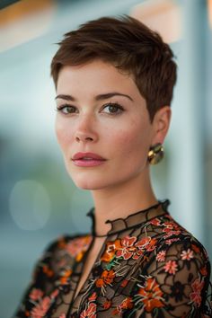 Woman with short brown hair wearing colorful floral embroidered top, looking confidently at the camera. Super Short Hair Women, Extra Short Pixie Haircut, Short Hairstyle Women 30s, Pixie Cropped Hair, Super Short Pixie Hair, Short Ladies Hairstyles, Women’s Short Hairstyles, Cropped Haircut For Women, Pixie Cut 2024