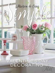 valentine's day decorating with pink roses in vases and dishes on the counter