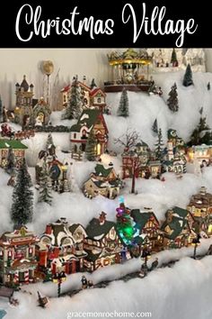 a christmas village is shown in the snow