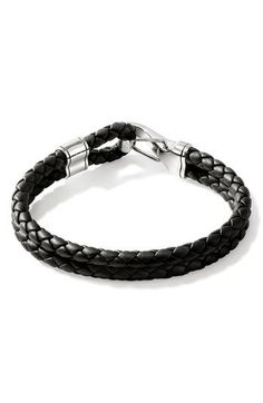 This handcrafted bracelet features braided leather and glinting sterling silver. Clasp closure Leather/sterling silver Imported Everyday Black Braided Leather Bracelet, Silver Leather Braided Bracelet, Luxury Leather Braided Men's Bracelet, Masculine Adjustable Braided Leather Bracelet, Black Leather Braided Bracelet With Stainless Steel Clasp, Braided Leather Bracelet, Handcrafted Bracelets, John Hardy, Braided Leather