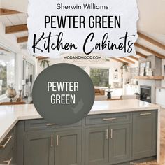 a kitchen with green cabinets and white counter tops in the center is an open floor plan