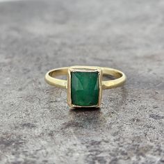 This beautiful handmade 14k Emerald Ring features a 6x8mm rose cut emerald bezel set in 14k yellow gold. It is a timeless piece that will make a stunning statement on any finger size 7. Emerald Ring, Bezel Setting, Earings Piercings, Rose Cut, Handmade Ring, Timeless Pieces, Emerald, Yellow Gold, Size 7