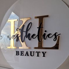 a sign that says it's aesthetics beauty on the side of a building