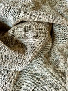 an up close shot of the fabric that has been made from burlocked linen