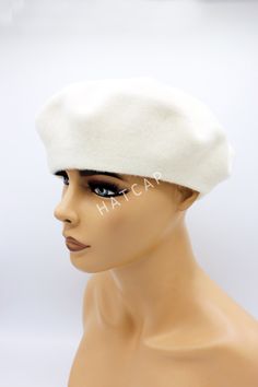 Our French felt beret with many beautiful different colors are perfect accessories for winter. Our women hats are knitting from felt , and one size fits all. It's very chic and warm Color : Cream, white All of our products are Free Express Shipping. Adjustable White Felt Hat For Winter, White Winter Beret Cap, Cream Winter Hat As Gift, White Winter Beret, Winter Flat Cap Beret For Gift, Flat Cap Hats As Winter Gifts, Winter Gift Beret Flat Cap, White Hat One Size Gift, White Wool Cap