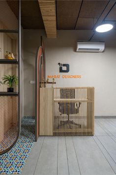 the interior of a modern office with wooden partitions and tile flooring, along with an air conditioner