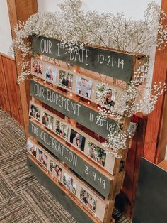 a wooden pallet with pictures and flowers on it for an anniversary celebration or bridal party