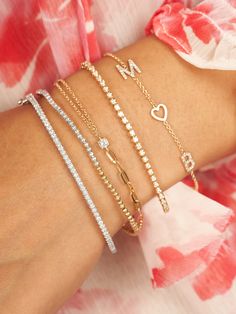 If you can't decide between a paperclip chain and cable chain, why not have both? This bracelet will add some style and sparkle to your stack! Layer it with some more dainty gold jewelry, initial jewelry, or even stack on the tennis jewelry! Initial Bracelet Gold, Tennis Jewelry, Dainty Gold Jewelry, Diamond Bangle Bracelet, Bracelet Size Chart, Tennis Chain, Diamond Bangles Bracelet, Initial Bracelet, Gold Initial