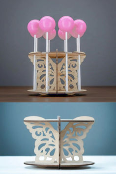 Add charm to your celebrations with this butterfly cake pop stand, a beautifully crafted portable wooden holder designed for displaying treats. Perfect for parties, weddings, and other events, its elegant design and sturdy build make it a practical and decorative centerpiece.  butterfly cake pop stand, portable cake holder, wooden treat stand, party decor, event display, cake pop display, dessert holder, unique party stand, wood projects, handmade treat stand Centerpiece Butterfly, Cake Pop Display, Cake Pop Stand, Cake Pop Displays, Display Cake, Dessert Holder, Treat Stand, Cake Pop Stands, Cake Holder