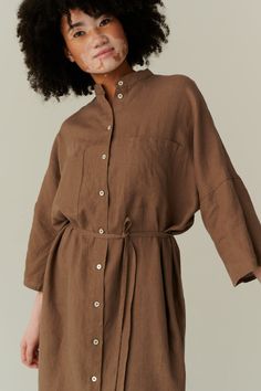 "This garment is oversized. Before placing an order, check the approximate measurements of the finished garment given below. FREE CUSTOMIZATION Important: We can make the garment longer by adding 15cm | 6″ free of charge Possible changes: Add pockets Lengthen | shorten the garment Lengthen | shorten the sleeves Change the color to one that is not listed but is available on the color palette. The above alterations make the item non-returnable and non-refundable. The model is 5'11\" (180cm) tall with a 94cm/37\" bust, 72cm/28.3\" waist, 99cm/39\" hips, and she is wearing an XS. XS Length ± 113cm | 44.5\" Bust ± 135cm | 53.1\" Sleeve length from HPS ± 60.5cm | 23.8\" Sleeve width ± 42cm | 16.5\" Hem width ± 135cm | 53.1\" S-M Length ± 114cm | 44.9\" Bust ± 143cm | 56.3\" Sleeve length from HP Dress Shirt Dress, Natural Linen Fabric, Linen Shirt Dress, Dress Linen, Oversized Dress, Midi Length Dress, Linen Dresses, Linen Dress, Comfortable Outfits