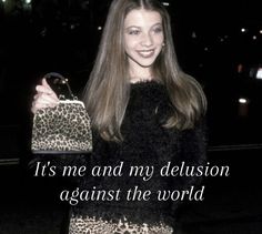 a woman holding a leopard print purse in her right hand and the words, it's me and my delusionion against the world