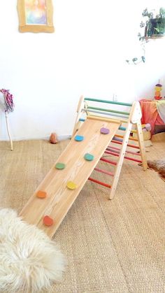 a child's play slide in the middle of a room