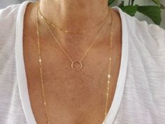 This small gold fill necklace is perfect for layering! The small 15mm circle charm is shown here hanging from a 17 inch gold fill chain. It is a perfect everyday necklace! The circle charm is made from high quality gold fill wire, so it will not tarnish or discolor. Can also be made in sterling silver as seen in the last photo or in a lovely silver and gold combo (gold circle and sterling silver chain.) *If you are unsure of the length you need, or would like to wear this item at different lengt Tiny Gold Necklace, Small Gold Necklace, Tiny Necklace, Tiny Charm, Necklace Layering, Gold Circle, Everyday Necklace, Layering Necklace, Circle Necklace