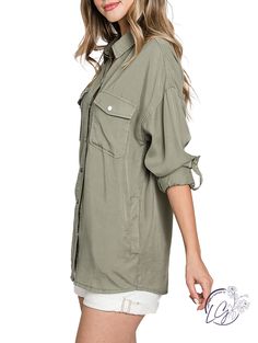 Oversized utility Shirt Made of Soft Washed Tencel. This Shirt has long sleeves with roll-up snaps, chest and side pockets. It's a Light and Oversized Top to Wear Open or Buttoned Up. Fabric: 100% Tencel Solid Utility Top With Button Closure, Khaki Long Sleeve Tops With Buttoned Pockets, Khaki Utility Tops With Buttoned Pockets, Oversized Khaki Tops With Buttons, Utility Button-up Tops For Spring, Utility Long Sleeve Shirt With Buttoned Pockets, Spring Utility Button-up Top, Spring Utility Tops With Buttoned Pockets, Oversized Tops With Buttoned Pockets For Fall