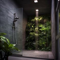 the shower is surrounded by plants and greenery