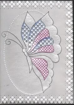 an embroidered butterfly with pink, white and blue wings on it's back side