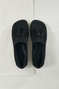 A modern minimalist loafer, crafted in tactile suede and detailed with hand-cut tassels. Modern Minimalist, Tassels