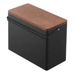 a black box with a wooden top on a white background