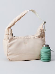 Stay organized in style! This mini shoulder purse is perfect for on-the-go essentials. With a convenient side pocket for quick access and three interior compartments to keep everything in its place, this purse is both functional and fashionable. Versatile On-the-go Hobo Bag, Trendy Shoulder Bag With Removable Pouch For Everyday, Versatile Hobo Bag With Zipper Pocket For On-the-go, Versatile Pouch Shoulder Bag With Zipper, Versatile Pouch Shoulder Bag With Zipper Closure, Versatile Crossbody Baguette Bag For On-the-go, Versatile Everyday Shoulder Bag With Cell Phone Pocket, Chic Everyday Hobo Bag With Cell Phone Pocket, Versatile Shoulder Bag With Cell Phone Pocket