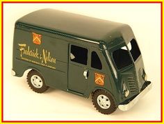 a green toy truck with an orange border around it's edges and the words franklin's natt written on the side