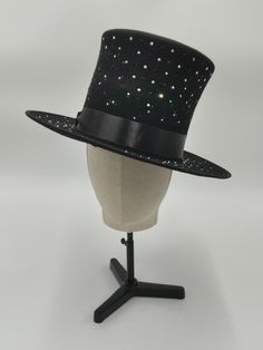 Here is the much awaited Top Hat available in different colors, black, red, pink and green etc. With or without rhinestones. and trimmed with a matching satin ribbon. Winter Party Top Hat With Curved Brim, Winter Party Top Hat With Flat Brim, Flat Brim Top Hat For Winter Party, Black Top Hat For Winter Party, Winter Party Top Hat With Short Brim, Fitted Hat Bands For Winter Party, Adjustable Holiday Evening Hat, Fitted Black Hat For Carnival, Fitted Party Costume Hat With Tall Crown