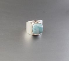 Larimar Ring , Blue Stone, Bridal Ring , Wedding Ring, Organic Ring, Sterling Silver Ring, Statement Ring, Gemstone Ring, Square Silver Ring............................................................................This is a highly spiritual stone that works effectively within all of the chakras from the heart chakra through to the crown chakra, including the higher heart, which aids compassion.It helps to release stored negative emotions such as angry thoughts, remembered pain and other detrim Wedding Larimar Gemstone Rings, Larimar Gemstone Jewelry For Wedding, Adjustable Blue Larimar Ring, Angry Thoughts, Ring Blue Stone, Ring Square, Blue Gemstone Rings, Larimar Ring, Larimar Rings