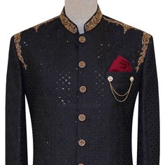 This exquisite Sequine Fabric Embroidered Black Classic Black Wedding Sherwani for Groom with Golden Embellishments is the perfect attire for your special day. Made with premium quality fabric and adorned with golden hand embellishments, this sherwani is sure to turn heads. The classic black color is timeless and elegant, while the golden embellishments add a touch of luxury. Black Traditional Wear With Gold Embroidery For Wedding, Black Sets With Gold Embroidery In Traditional Drape, Black Wedding Sets With Gold Embroidery, Black Wedding Set With Gold Embroidery, Black Sherwani With Gold Embroidery For Eid, Black Sherwani With Gold Embroidery For Festive Occasions, Festive Black Sherwani With Gold Embroidery, Black Traditional Wear With Intricate Embroidery For Wedding, Designer Bandhgala With Gold Embroidery For Reception