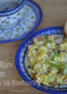 eggs and sausage in a blue bowl next to toast on a wooden table with the words egg salad