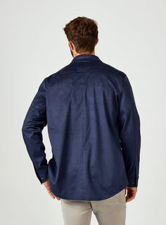 A staple in every well-dressed guy's wardrobe, this jacket is an essential you'll love. This lightweight, comfortable, and easy layering piece will be your go-to. Details Model is 6'1" and wears a size medium. Care: Permanent Press cycle. Machine wash cold on delicate cycle. Do not tumble dry. Iron on low. Dry clean for best results. Composition: 87% Polyester | 13% Elastane Navy Button-up Outerwear With Patch Pockets, Navy Long Sleeve Utility Jacket For Fall, Casual Collared Sport Coat With Welt Pockets, Casual Unstructured Button-up Sport Coat, Collared Sport Coat For Business Casual In Fall, Business Cotton Outerwear With Long Sleeves, Navy Casual Long Sleeve Outerwear, Casual Navy Long Sleeve Outerwear, Business Casual Collared Sport Coat For Fall