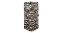 a tall tower made out of rocks on a white background