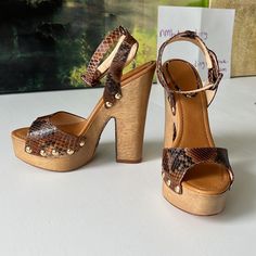 - Designer = Alexandre Birman - Size = 10m(40) Trunk 22 - Alexandre Birman Crocodile Print Leather Open Toe 8m Ankle Wrap Platform Sandals -3heel Height= Approximately 6”Inches Inches (15.2) - Platform Height = 1.75”Inches (4cm) - Measured On The Inside From Front Tip Of Open Toe To Back Tip Of Heel To Give An Estimate Of Size Length = Approximately 26cm - Genuine And Authentic Or Your Money 9back Trunk 22 Chic Leather Heels With Crocodile Pattern, Brown Leather Heels With Crocodile Pattern, High Heel Leather Heels With Crocodile Pattern, High Heels With Crocodile Pattern Leather, Leather Open Toe Heels With Crocodile Pattern, Open Toe Leather Heels With Crocodile Pattern, Leather Snake Print Heels For Formal Occasions, Luxury Crocodile Pattern Heels For Party, Formal Leather Heels With Snake Print