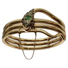 Edwardian Diamond Emerald Bangle Snake Bracelet Silver Top 14K American Gold 1900s 27.1 gram Acid tested 14K Gold, Silver top Outer diameter; 2.5 inch by 2.25 inch, with 1/4 inch Thickness Spring is loaded and in perfect condition folding in three sections, Three Part Loaded Hinged 4 mm by 5 mm Square Emerald & 11 Rose Cut Diamonds plus Garnet or Ruby eyes all set on Silver, Silver Top Well cared for, few dents, minimal abrasion consistent with 130 Yrs of age, perfectly functional, see pictures Victorian Yellow Gold Bangle Bracelet, Victorian Style Yellow Gold Bangle Bracelet, Antique Yellow Gold Bracelet For Formal Occasions, Antique Yellow Gold Bracelets For Formal Occasions, Victorian 14k Gold Bangle Bracelet, Antique Hinged Gold Bracelet For Formal Occasions, Antique Gold Hinged Bracelet For Formal Occasions, Yellow Gold Art Deco Bracelet, Antique 14k Gold Bangle Bracelet