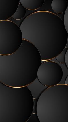 an abstract black and gold background with circles