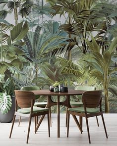 a dining room table with chairs and a plant wallpapered in green foliage behind it