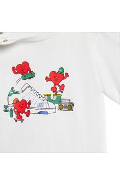 Cartoony hearts celebrate the sport and skate culture of adidas on this cool cotton graphic T-shirt sized just for kiddos. Top has shoulder snap closure 100% cotton Machine wash, line dry Imported Sporty T-shirt With Cartoon Print For Sports, Sporty Summer Tops With Cartoon Print, Relaxed Fit Graphic Print T-shirt For Playwear, White Cartoon Print Sports Top, White Cartoon Print Tops For Sports, Playful Cotton T-shirt For Streetwear, Sporty Cotton Tops With Cartoon Print, Heart Graphic T-shirt For Spring Streetwear, Spring Heart Graphic T-shirt For Streetwear