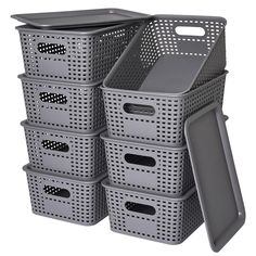 six plastic storage baskets stacked on top of each other