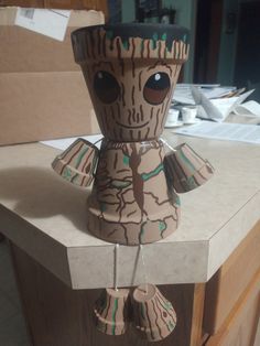 a cardboard groote is sitting on top of a table