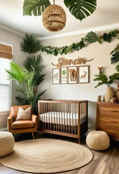 a baby's room decorated in neutral colors and greenery