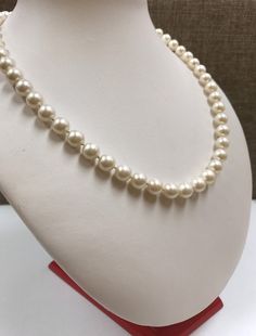 "Welcome To Gold Knox Beautiful classic white round pearl necklace with beautiful 14K yellow gold flower clasp. Each pearl is 7.3 mm. Perfect gift for moms. Details below: Material: yellow gold, white pearl Necklace Length: 18\" long Hallmark 14K This would make great addition to your vintage silver collection. Thank you for looking Gold Knox opened its storefront in Pasadena, CA in 2011, since then we have an online store on eBay, and we joined Etsy in 2016 where we offer our unique and desirab Classic Single Strand Pearl Necklace With Round Beads, Classic Single Strand Pearl Beaded Necklace, Classic Single Strand Pearl Beaded Necklaces, Classic Formal Pearl Necklace With 8mm Beads, Classic 8mm Bead Pearl Necklace For Formal Occasions, Formal Pearl White Necklace With Round Beads, Classic Pearl Drop Beaded Necklace With Round Beads, Classic Pearl Necklace For Wedding With 8mm Beads, Classic Wedding Pearl Necklace With 8mm Beads