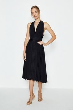 Well, there's nothing our midi dress can't do. Designed to be worn in countless ways, you can make this jersey number look however you fancy. Think asymmetrical, backless, bandeau, caped, draped... The list goes on!Style: Midi DressDesign: PlainFabric: JerseyLength: MidiNeckline: V NeckSleeve Length: Short Sleeve Black Bridesmaids Dresses, Claudia Dress, Tube Midi Dress, Black Bridesmaids, Draped Midi Dresses, London Dress, Bridesmaid Dress Colors, Black Slip Dress, Midi Slip Dress