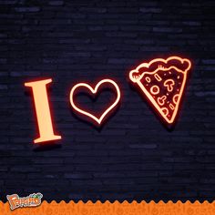 i love pizza neon sign on brick wall with heart and piece of pizza in the middle