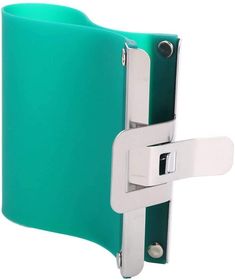 a close up of a green binder on a white background with clippings