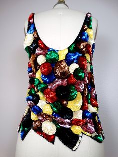 "A fun, fully embellished vintage piece in perfect condition! Measurements: Bust - 32/34\" Length - 21\" Tag Size - Medium (fits like a small) All items come from a smoke-free and pet-free home. If you have any questions, please don't hesitate to ask!" Bohemian Multicolor Party Tops, Fun Multicolor Tops For Party, Embroidered Tops For Party And Festivals, Fun Multicolor Party Tops, Multicolor Party Tops For Festivals, Multicolor Tops For Party And Festivals, Vintage Multicolor Tops For Party, Trendy Multicolor Sequined Tops, Multicolor Sequined Tops For Festivals