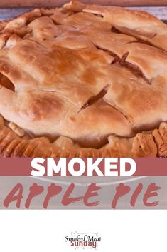 an apple pie is shown with the words smoked apple pie on top and below it