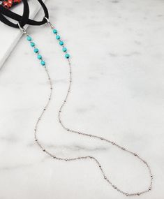 "This 28-inch face mask chain is made with ten 6mm round blue howlite beads which we've wired onto antiqued silver cable chain. The ends of the chain easily attach to your face mask straps with large teardrop lobster clasps. Thank you for looking. BONUS: On Gemsicles, every face mask or facemask chain purchase comes with a FREE individually sealed disposable face mask. Click here to see all of the Gemsicles face masks and chains >> https://www.etsy.com/shop/Gemsicles?ref=simple-shop-header Blue Round Bead Necklaces As Fashion Accessory, Blue Necklaces With Round Beads As Fashion Accessory, Blue Round Bead Necklaces, Blue Necklace With Round Beads As Fashion Accessory, Adjustable Turquoise Beaded Chain Choker, Blue Necklaces With Black Beads For Festival, Blue Necklace With Black Beads For Festival, Blue Beaded Chain Choker For Festival, Blue Adjustable Necklace