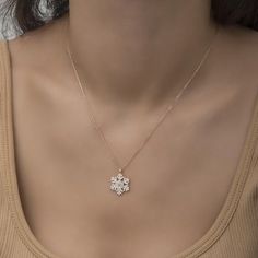 Introducing our exquisite Snowflake Necklace Diamond! Delicately crafted with a Magnolia Flower design it's the perfect gift for Mom. Elegant timeless and sure to dazzle on any occasion. Add a touch of sophistication to your ensemble today!• Material: High-Quality Solid 925 Sterling Silver• Finish: Sterling Silver Rose Gold or Gold• A special piece you'll treasure• High-quality materials and attention to detail• Our jewelry is designed With 🖤️ In NY Elegant Snowflake Pendant Necklace For Gifts, Elegant Snowflake Necklace Gift, Elegant Snowflake Necklace For Gift, Elegant Snowflake Necklace Perfect For Gifts, White Snowflake Necklace For Wedding, Snowflake Necklace, Magnolia Blossom, Necklace Diamond, Magnolia Flower