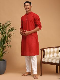 SHVAAS by VASTRAMAY Men's Maroon Cotton Handloom Kurta with White Cotton Pant Set Elevate your ethnic wardrobe with this elegant maroon cotton handloom kurta paired with white cotton pants from SHVAAS by VASTRAMAY. Perfect for festive occasions or casual gatherings, this set offers comfort and style. Features: Color: Maroon Kurta, White Pant Fabric: Cotton Handloom Neck: Mandarin Collar Sleeves: Full Sleeves Fit: Regular Fit Occasion: Festive, Casual Wash Care: Hand Wash Specifications: Brand: S Traditional Red Cotton Kurta, Casual Cotton Traditional Wear For Eid, Cotton Kurta With Traditional Patterns And Fit, Traditional Cotton Kurta With Traditional Patterns, Cotton Kurta With Pallu For Transitional Season, Fitted Cotton Kurta For Puja, Long Sleeve Cotton Traditional Wear With Handloom, Handloom Cotton Traditional Long Sleeve Wear, Traditional Long Sleeve Cotton Kurta