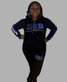 This one of a kind Zeta Phi Beta tracksuit is just what you need for a nice run when it's cold out or for catching a ball game. It is laced with comfort and soft cotton, a hood for extra warmth and a front pocket. Step out in style with this awesome set. FEATURES: Elasticized waistband, with adjustable drawstring. On-seam welt pockets Elasticized cinched-leg openings. Cozy, soft-washed cotton Fits true to size; light stretch Athleisure Activewear For Sports Season And Team Events, Athleisure Activewear For Team Events, Athleisure Activewear For Team Events And Sports Season, Fitted Sports Hoodie For Sports Season, Fitted Sportswear Hoodie For Sports Season, Fitted Athleisure Tracksuit With Drawstring Hood, Fitted Sports Tracksuit, Winter Athleisure Tracksuit For Sports Events, Winter Athleisure Tracksuit